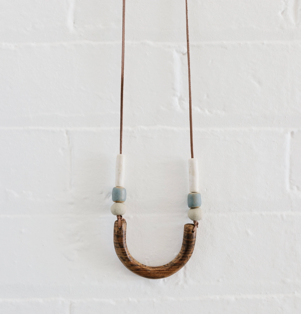Woodfolk - Wood and Ceramic Curved U Necklace